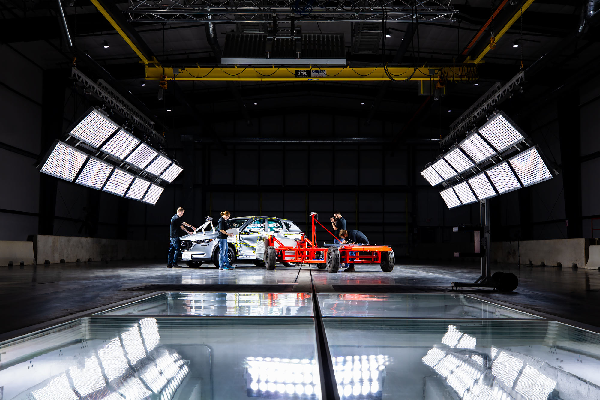 Technicians measure results of an automotive crash test |  Scott Gable industrial photographer