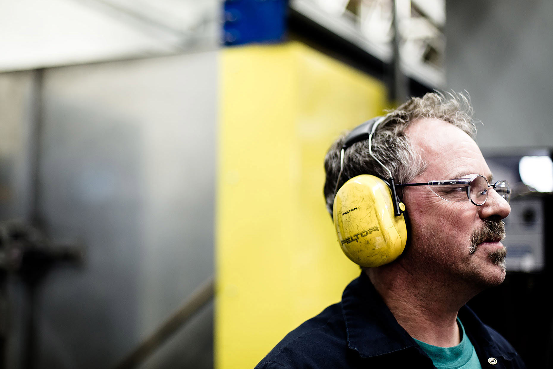 Industrial worker wearing ear protection | Scott Gable is an advertising and editorial photographer providing photography and video to corporate, industrial, healthcare, agriculture, and hi-tech clients worldwide.