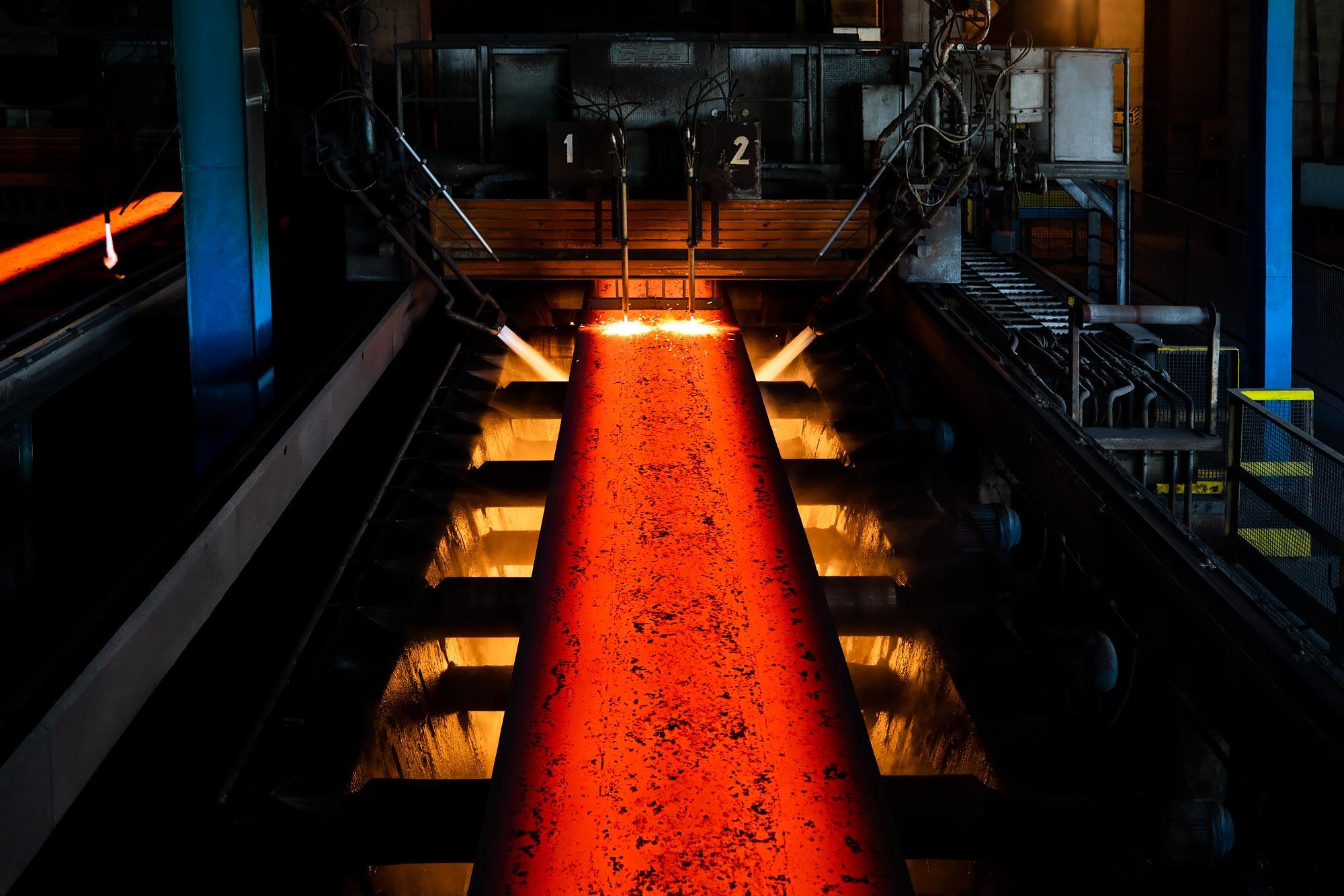 Slab steel coming from a hot rolling press | Scott Gable industrial photographer
