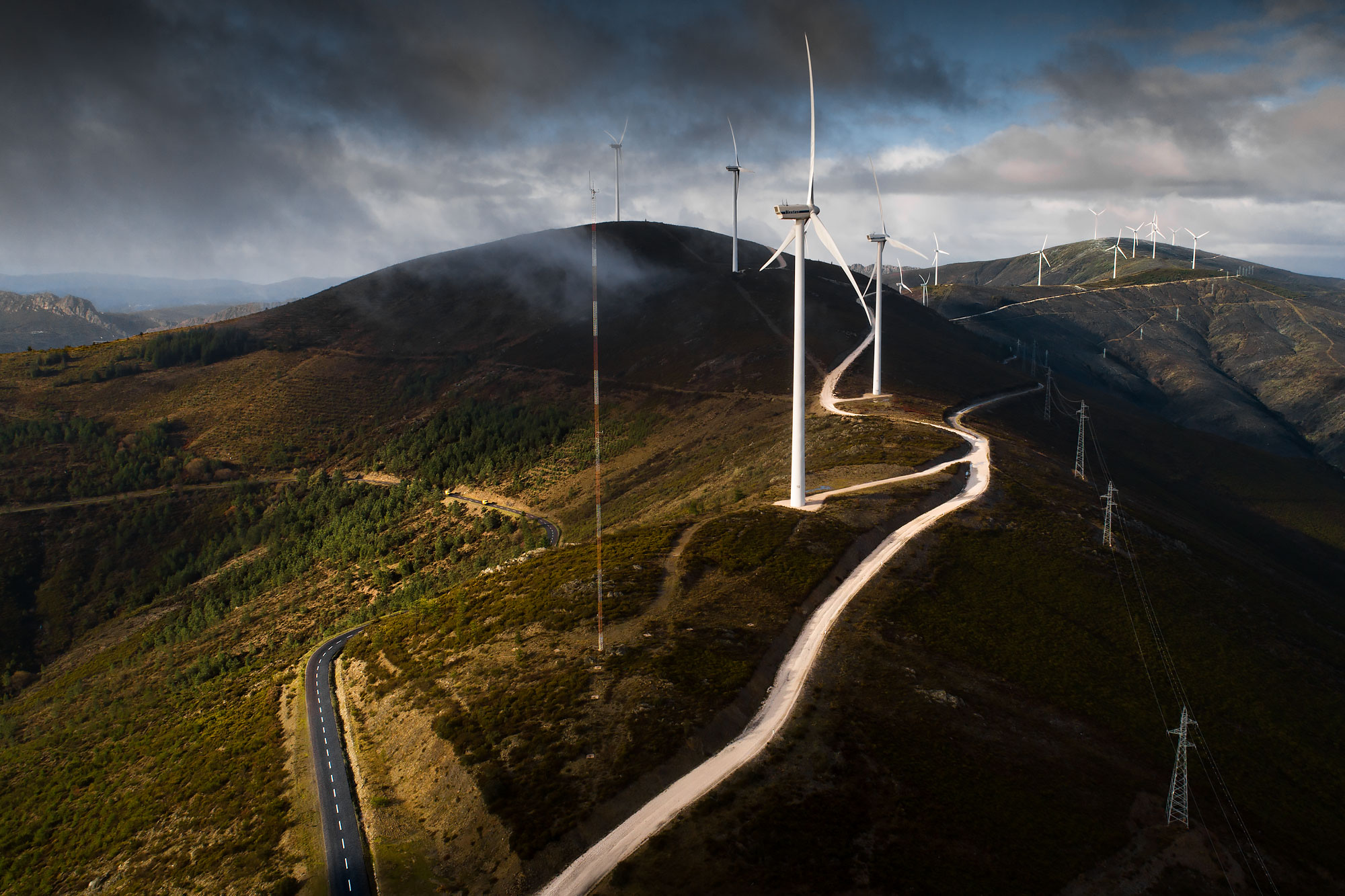 Aerial view of a row of wind turbines along a mountain ridge | Scott Gable industrial photographer